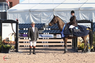 Katie Monahan-Prudent and V in their winning presentation with ringmaster Cliff Haines
